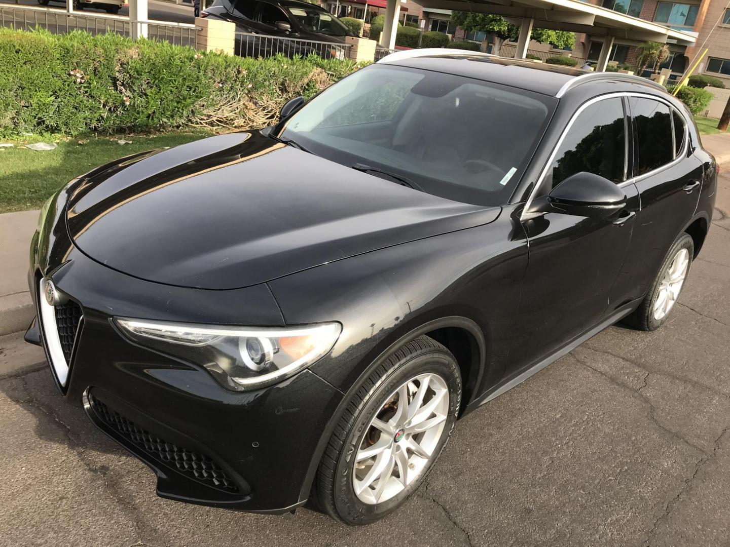 2018 BLACK /black Alfa Romeo Stelvio Ti (ZASFAKBN3J7) with an 2.0L L4 DOHC 16V engine, 8A transmission, located at 323 E Dunlap Ave., Phoenix, AZ, 85020, (602) 331-9000, 33.567677, -112.069000 - 2018 ALFA ROMEO STELVIO TI CROSSOVER SUV, 4WD AWD ...... 2.0L Automatic, Low mileage 110k .... A Must See!!..... LUXURY SUV, Cold cold AC. Loaded with Power Options, Beautiful black leather seats, Back-up Camera, Clean Arizona title , Runs and Drives Excellent. Great Family SUV, passed emissions. - Photo#1