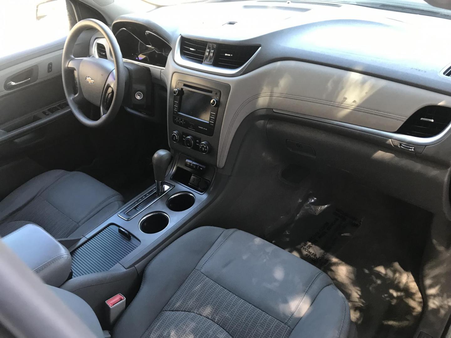 2016 silver /gray Chevrolet Traverse LS FWD (1GNKRFKD9GJ) with an 3.6L V6 DOHC 24V engine, 6A transmission, located at 323 E Dunlap Ave., Phoenix, AZ, 85020, (602) 331-9000, 33.567677, -112.069000 - 2016 Chevy Traverse SUV,.......with 3RD ROW SEATING, with LOW 113K MILES!!.... Ice Cold A/C, Silver and gray seats , Power Options, Backuup camera, Runs and Drives Excellent.....great family SUV, passed emissions..... Call or text Dave 602-331-9000 thanks for looking, talk to you soon......Price - Photo#7