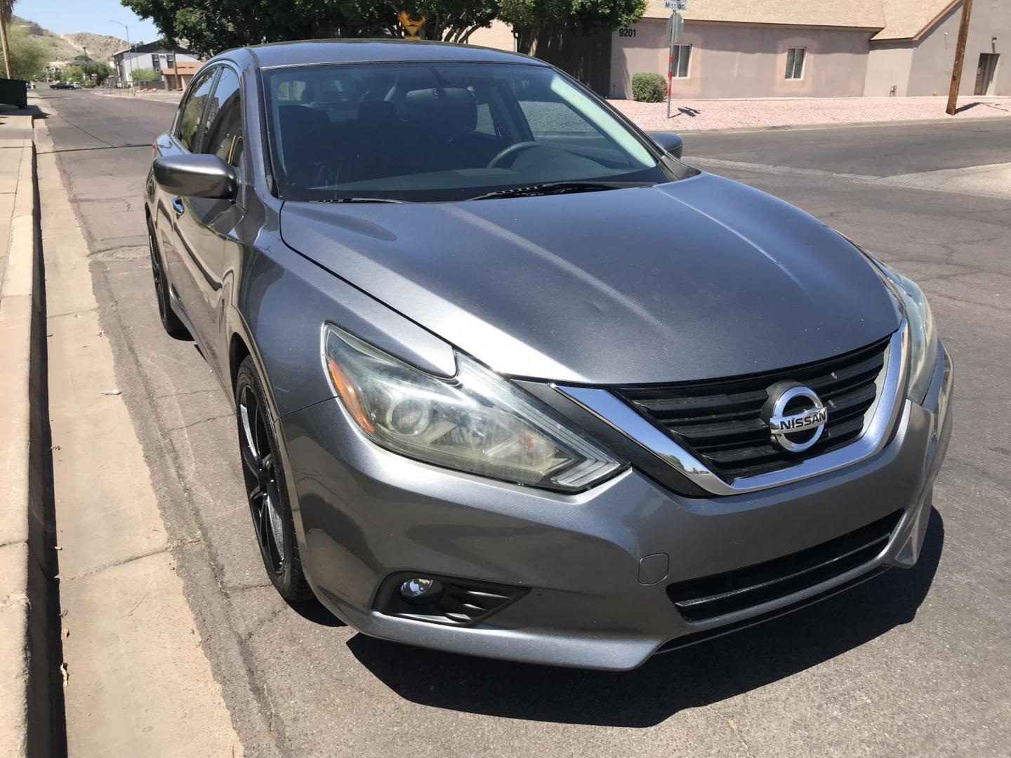2017 gray /gray Nissan Altima 2.5 S (1N4AL3AP5HC) with an 2.5L L4 DOHC 16V engine, CVT transmission, located at 323 E Dunlap Ave., Phoenix, AZ, 85020, (602) 331-9000, 33.567677, -112.069000 - 2017 NISSAN ALTIMA, Automatic, 2.5L , 4cyl. Super Economical ........LOW 143k miles, .... A Must See!! ....... Ice cold AC...... The car is gorgeous inside and out. Power windows, Power door locks, Premium Stereo/CD Player, Beautiful Gray and gray interior in good condition, Clean Arizona title , Ru - Photo#3