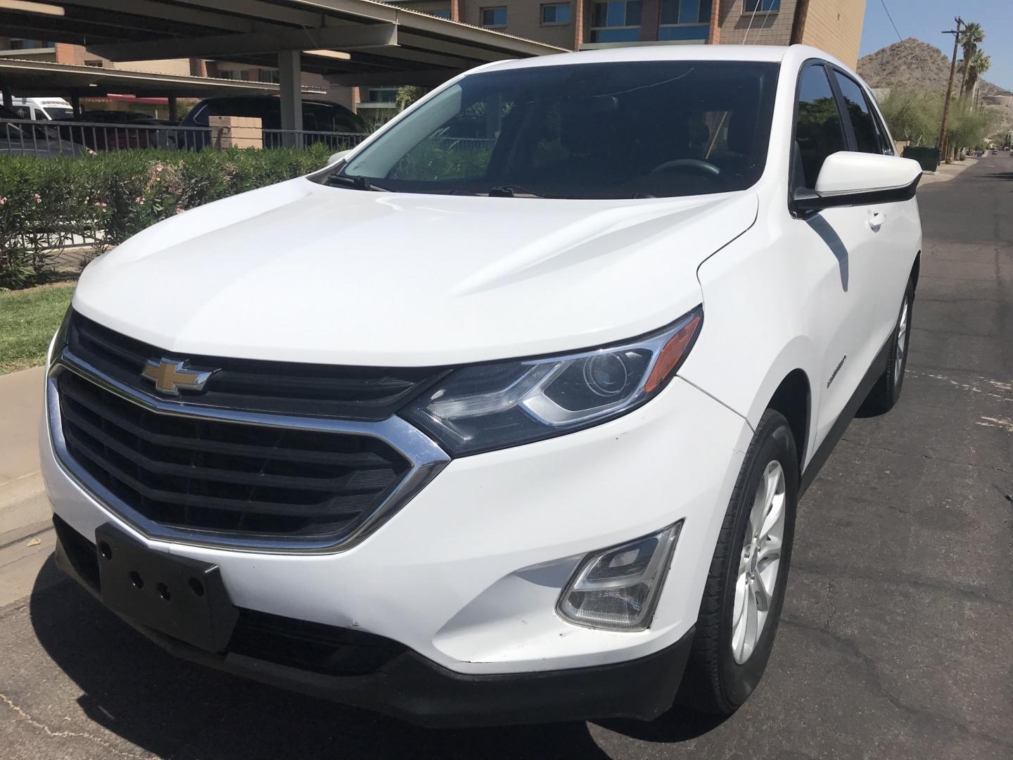 2021 WHITE /gray Chevrolet Equinox LT AWD (2GNAXUEVXM6) with an 1.5L L4 DOHC 16V TURBO engine, 6A transmission, located at 323 E Dunlap Ave., Phoenix, AZ, 85020, (602) 331-9000, 33.567677, -112.069000- Photo#0