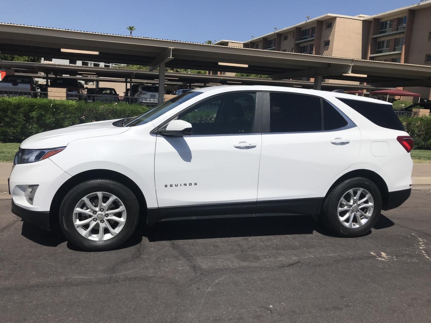 2021 WHITE /gray Chevrolet Equinox LT AWD (2GNAXUEVXM6) with an 1.5L L4 DOHC 16V TURBO engine, 6A transmission, located at 323 E Dunlap Ave., Phoenix, AZ, 85020, (602) 331-9000, 33.567677, -112.069000- Photo#2