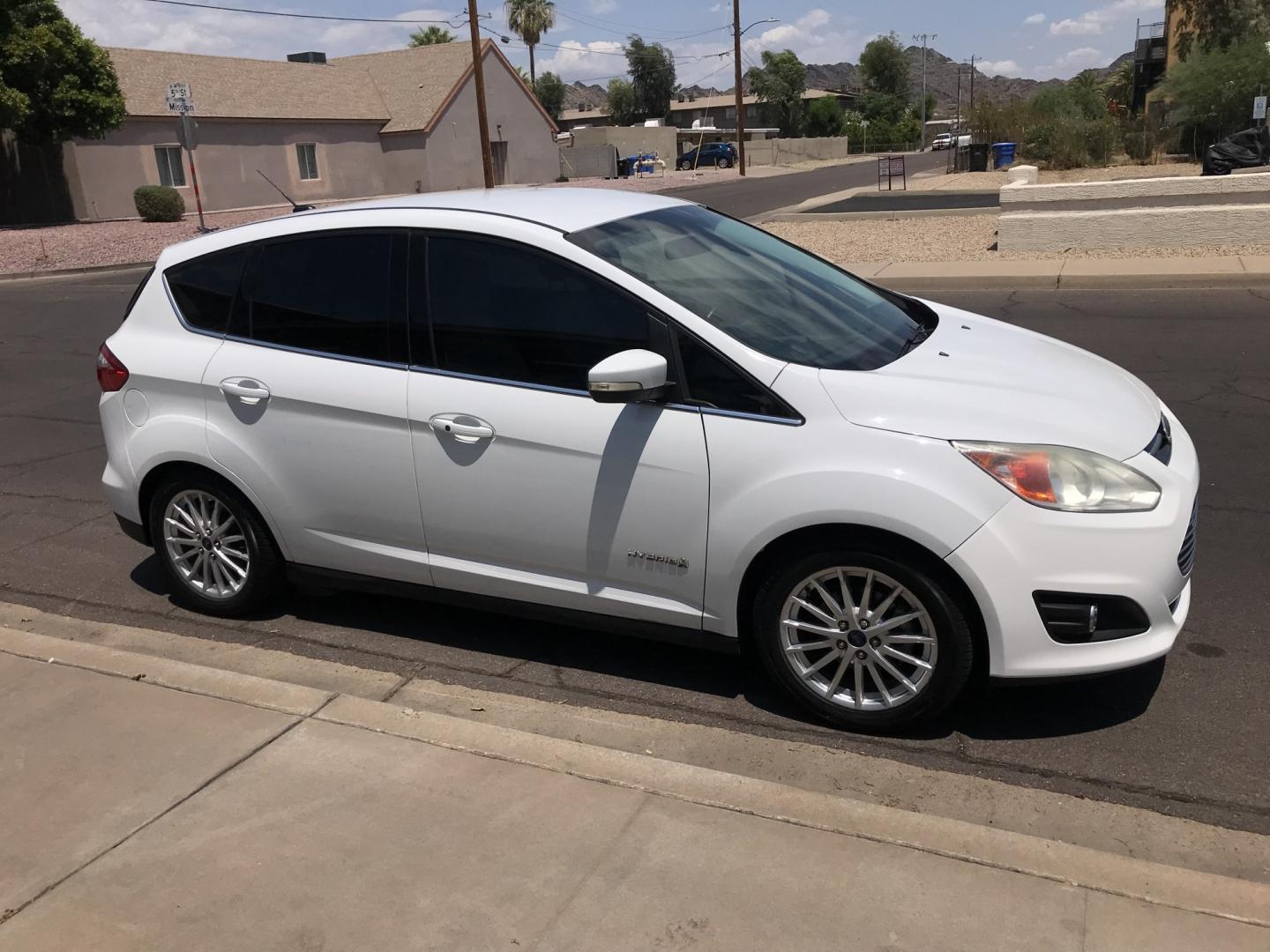 2014 WHITE /gray Ford C-Max Hybrid SEL (1FADP5BU1EL) with an 2.0L L4 DOHC 16V HYBRID engine, CVT transmission, located at 323 E Dunlap Ave., Phoenix, AZ, 85020, (602) 331-9000, 33.567677, -112.069000 - 2014 Ford C-MAX Hybrid SEL ,........great condition, A Real Must See!!.... Automatic, Power Options, Ice cold ac, Clean gray interior, Super Econimical, clean Arizona title, Runs and Drives Excellent. Very clean inside and out, It has a 138k Miles, passed emissions. Any questions Call or text Dave- Photo#6