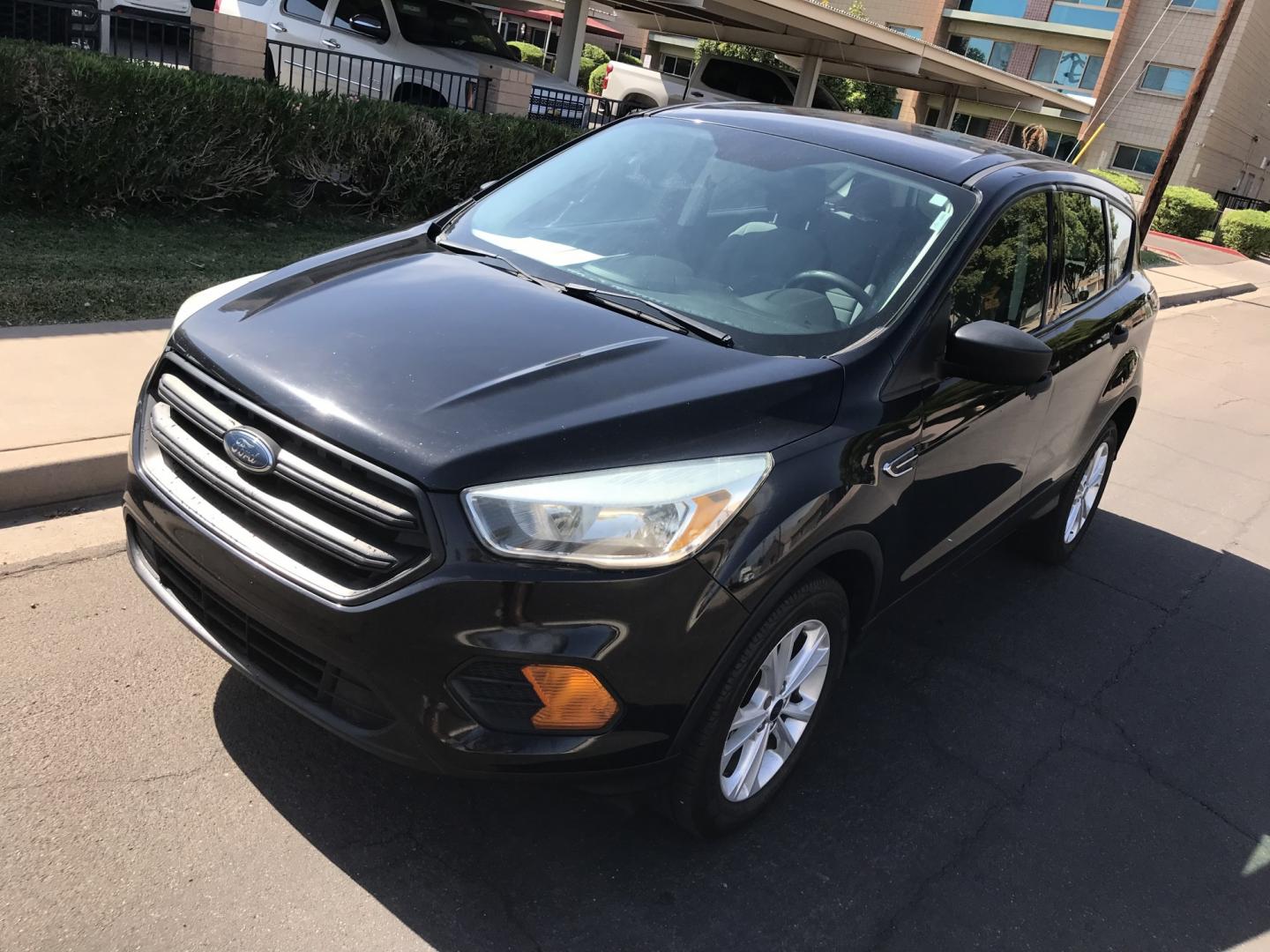 2017 gray /gray Ford Escape S FWD (1FMCU0F78HU) with an 2.5L L4 DOHC 16V engine, 6A transmission, located at 323 E Dunlap Ave., Phoenix, AZ, 85020, (602) 331-9000, 33.567677, -112.069000 - 2017 FORD ESCAPE SUV ,........ Great condition,.... Automatic, Ice Cold A/C, Beautiful gray exterior withdark gray interior, Premium Sound CD, This suv is gorgeous inside and out, Super clean, Well Maintained, Arizona title , Runs and Drives Excellent.....LOW MILES, ONLY 88k original miles, passed e- Photo#1