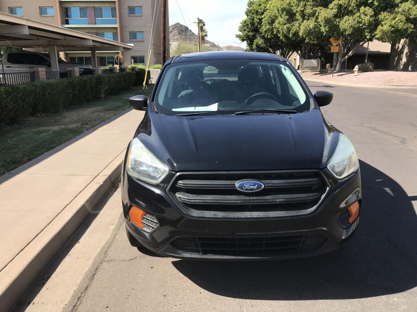 2017 gray /gray Ford Escape S FWD (1FMCU0F78HU) with an 2.5L L4 DOHC 16V engine, 6A transmission, located at 323 E Dunlap Ave., Phoenix, AZ, 85020, (602) 331-9000, 33.567677, -112.069000 - 2017 FORD ESCAPE SUV ,........ Great condition,.... Automatic, Ice Cold A/C, Beautiful gray exterior withdark gray interior, Premium Sound CD, This suv is gorgeous inside and out, Super clean, Well Maintained, Arizona title , Runs and Drives Excellent.....LOW MILES, ONLY 88k original miles, passed e- Photo#3