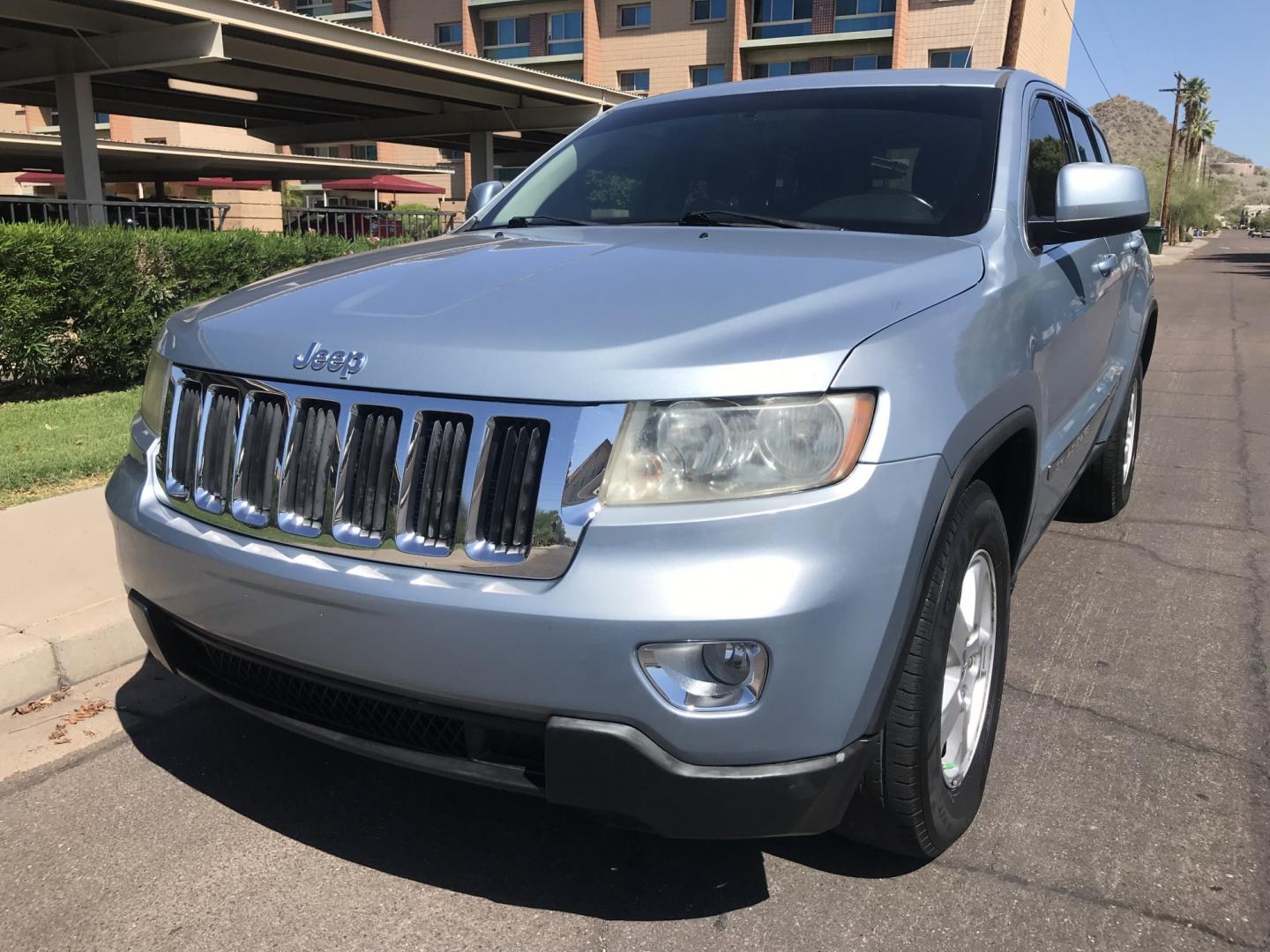 2013 BLUE /gray Jeep Grand Cherokee Laredo 2WD (1C4RJEAG7DC) with an 3.6L V6 DOHC 24V engine, 5-Speed Automatic transmission, located at 323 E Dunlap Ave., Phoenix, AZ, 85020, (602) 331-9000, 33.567677, -112.069000 - 2013 JEEP GRAND CHEROKEE LAREDO SUV ,........ Great condition,.... Automatic, Ice Cold A/C, Beautiful blue exterior with dark gray interior, Premium Sound CD, This SUV is gorgeous inside and out, Super clean, Well Maintained, Arizona title , Runs and Drives Excellent.....LOW MILES, ONLY 153k origina- Photo#0
