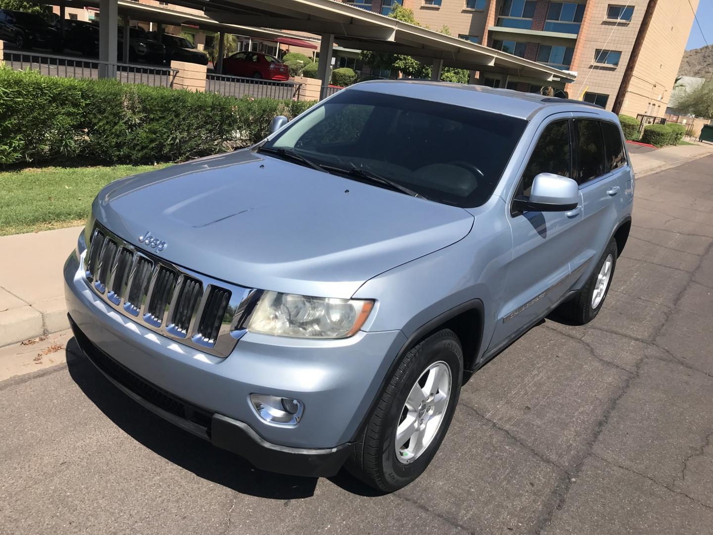 2013 BLUE /gray Jeep Grand Cherokee Laredo 2WD (1C4RJEAG7DC) with an 3.6L V6 DOHC 24V engine, 5-Speed Automatic transmission, located at 323 E Dunlap Ave., Phoenix, AZ, 85020, (602) 331-9000, 33.567677, -112.069000 - 2013 JEEP GRAND CHEROKEE LAREDO SUV ,........ Great condition,.... Automatic, Ice Cold A/C, Beautiful blue exterior with dark gray interior, Premium Sound CD, This SUV is gorgeous inside and out, Super clean, Well Maintained, Arizona title , Runs and Drives Excellent.....LOW MILES, ONLY 153k origina- Photo#1