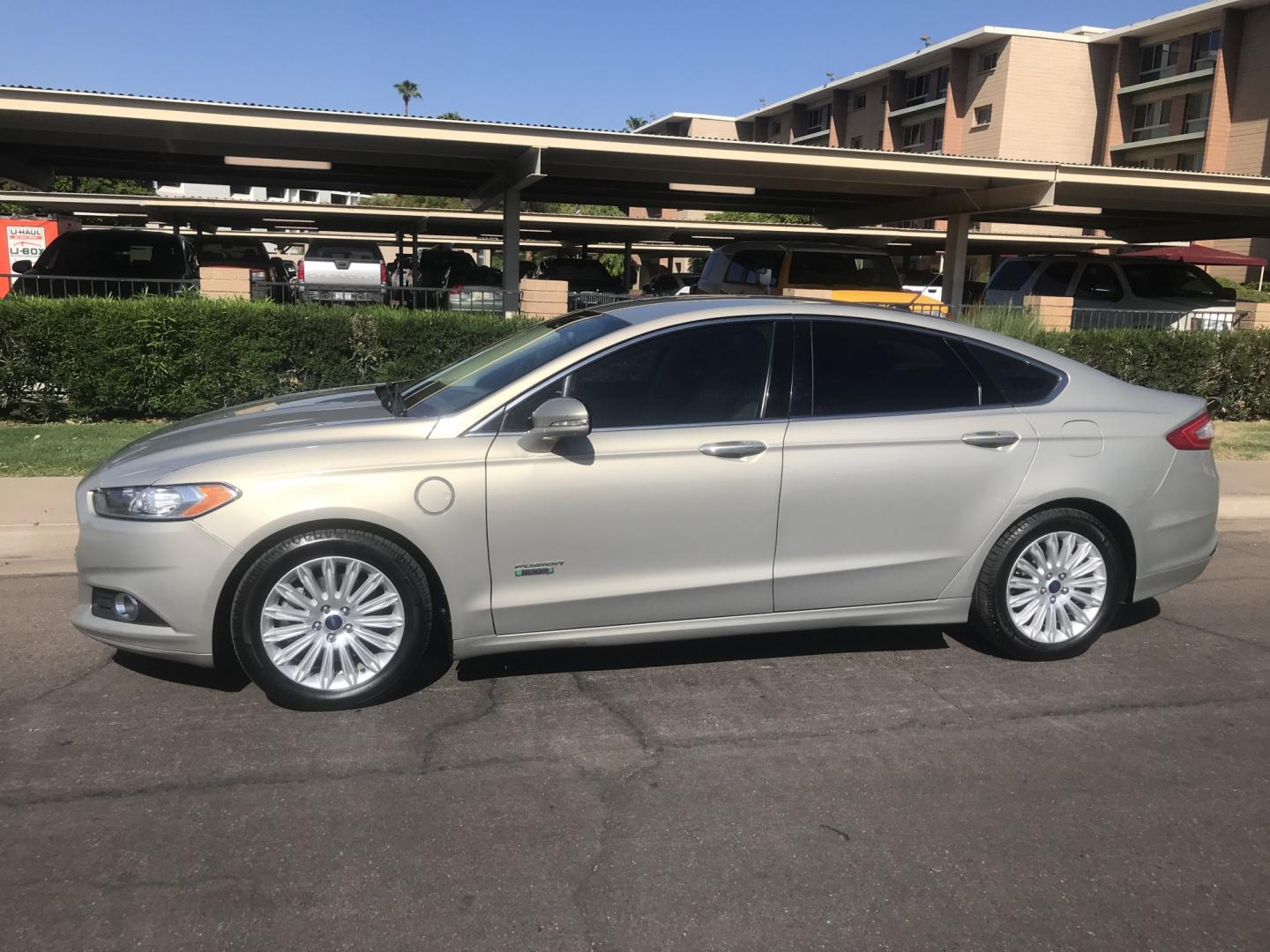 2015 gold /tan Ford Fusion Energi SE (3FA6P0PU9FR) with an 2.0L L4 DOHC 16V HYBRID engine, CVT transmission, located at 323 E Dunlap Ave., Phoenix, AZ, 85020, (602) 331-9000, 33.567677, -112.069000 - 2015 Ford Fusion HYBRID ,........GREAT condition, A Real Must See!!.... LOW 120k miles, Automatic, Power Options, Premium Sound CD, Ice cold ac, Clean gold exterior with beige seats, clean Arizona title, Runs and Drives Excellent. Very clean inside and out, SUPER ECONOMICAL Sedan, Any questions Call- Photo#2