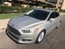 2015 gold /tan Ford Fusion Energi SE (3FA6P0PU9FR) with an 2.0L L4 DOHC 16V HYBRID engine, CVT transmission, located at 323 E Dunlap Ave., Phoenix, AZ, 85020, (602) 331-9000, 33.567677, -112.069000 - 2015 Ford Fusion HYBRID ,........GREAT condition, A Real Must See!!.... LOW 120k miles, Automatic, Power Options, Premium Sound CD, Ice cold ac, Clean gold exterior with beige seats, clean Arizona title, Runs and Drives Excellent. Very clean inside and out, SUPER ECONOMICAL Sedan, Any questions Call- Photo#1