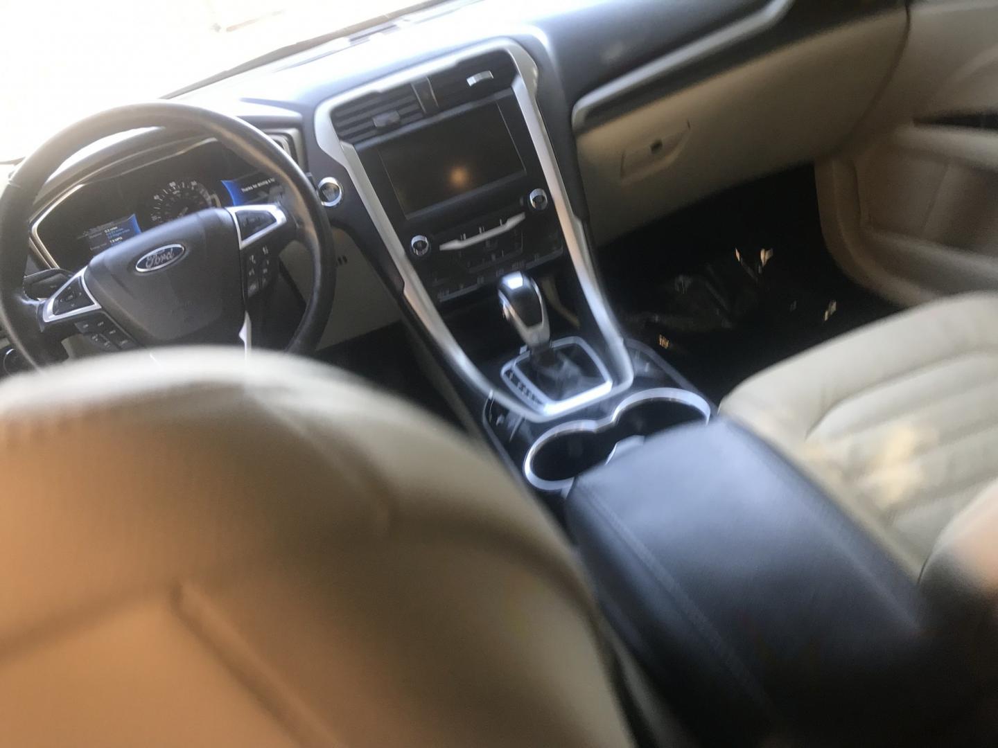 2015 gold /tan Ford Fusion Energi SE (3FA6P0PU9FR) with an 2.0L L4 DOHC 16V HYBRID engine, CVT transmission, located at 323 E Dunlap Ave., Phoenix, AZ, 85020, (602) 331-9000, 33.567677, -112.069000 - 2015 Ford Fusion HYBRID ,........GREAT condition, A Real Must See!!.... LOW 120k miles, Automatic, Power Options, Premium Sound CD, Ice cold ac, Clean gold exterior with beige seats, clean Arizona title, Runs and Drives Excellent. Very clean inside and out, SUPER ECONOMICAL Sedan, Any questions Call- Photo#11
