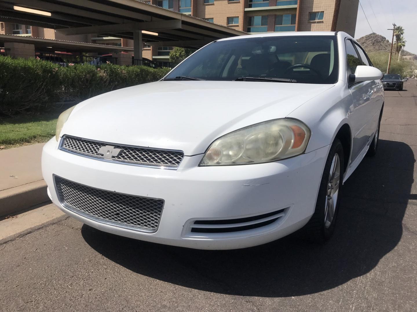2013 WHITE /gray Chevrolet Impala LT (2G1WB5E3XD1) with an 3.6L V6 DOHC 16V FFV engine, 6-Speed Automatic transmission, located at 323 E Dunlap Ave., Phoenix, AZ, 85020, (602) 331-9000, 33.567677, -112.069000 - 2013 CHEVY IMPALA LT ,........ Automatic, Ice Cold A/C, Beautiful white exterior with gray interior, Premium Sound CD, Michelin tires, This sedan is gorgeous inside and out, Super clean, Well Maintained, Arizona title , Runs and Drives Excellent.....196k original miles, passed emissions..... Call- Photo#0