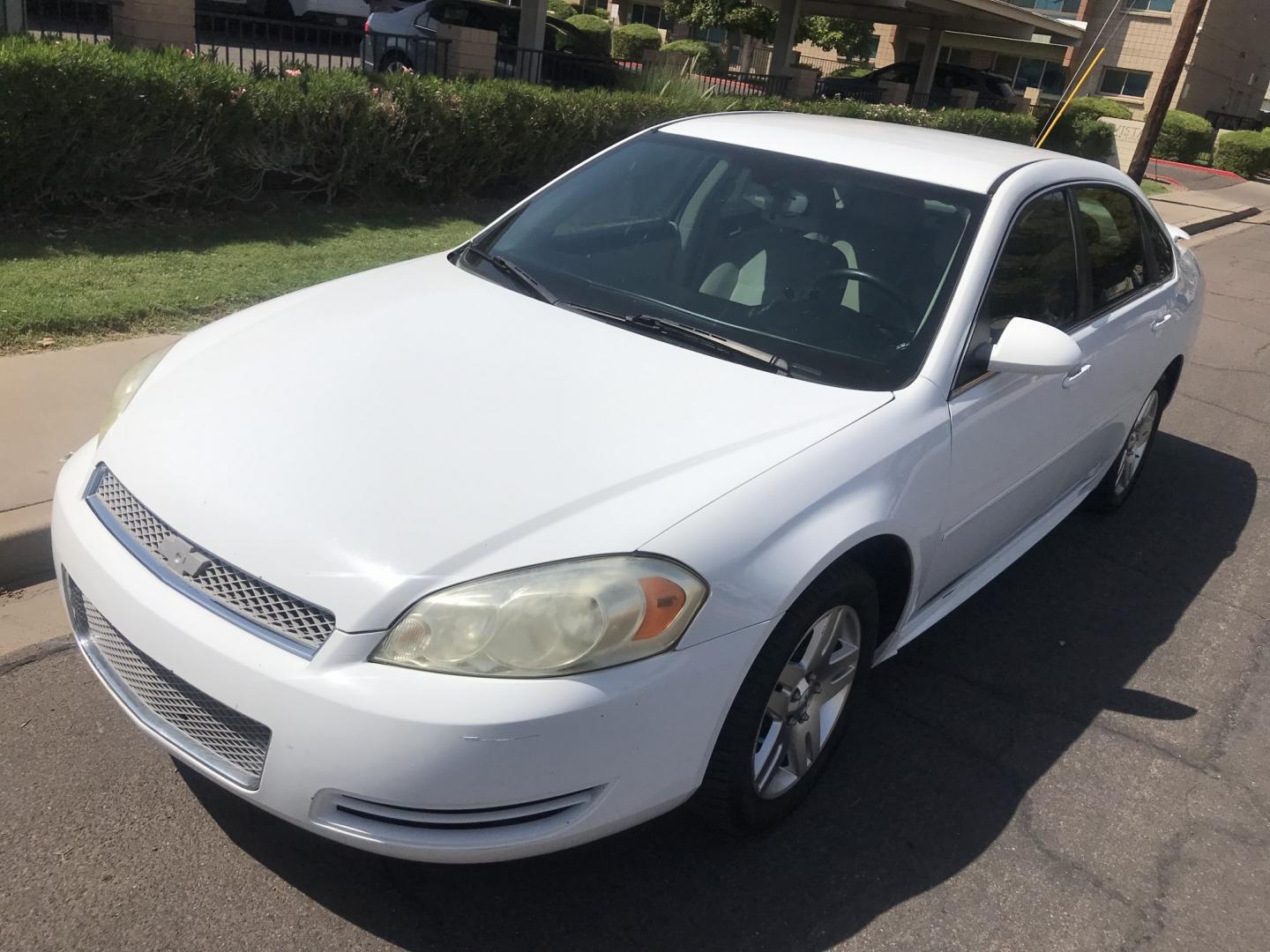 2013 WHITE /gray Chevrolet Impala LT (2G1WB5E3XD1) with an 3.6L V6 DOHC 16V FFV engine, 6-Speed Automatic transmission, located at 323 E Dunlap Ave., Phoenix, AZ, 85020, (602) 331-9000, 33.567677, -112.069000 - 2013 CHEVY IMPALA LT ,........ Automatic, Ice Cold A/C, Beautiful white exterior with gray interior, Premium Sound CD, Michelin tires, This sedan is gorgeous inside and out, Super clean, Well Maintained, Arizona title , Runs and Drives Excellent.....196k original miles, passed emissions..... Call- Photo#1
