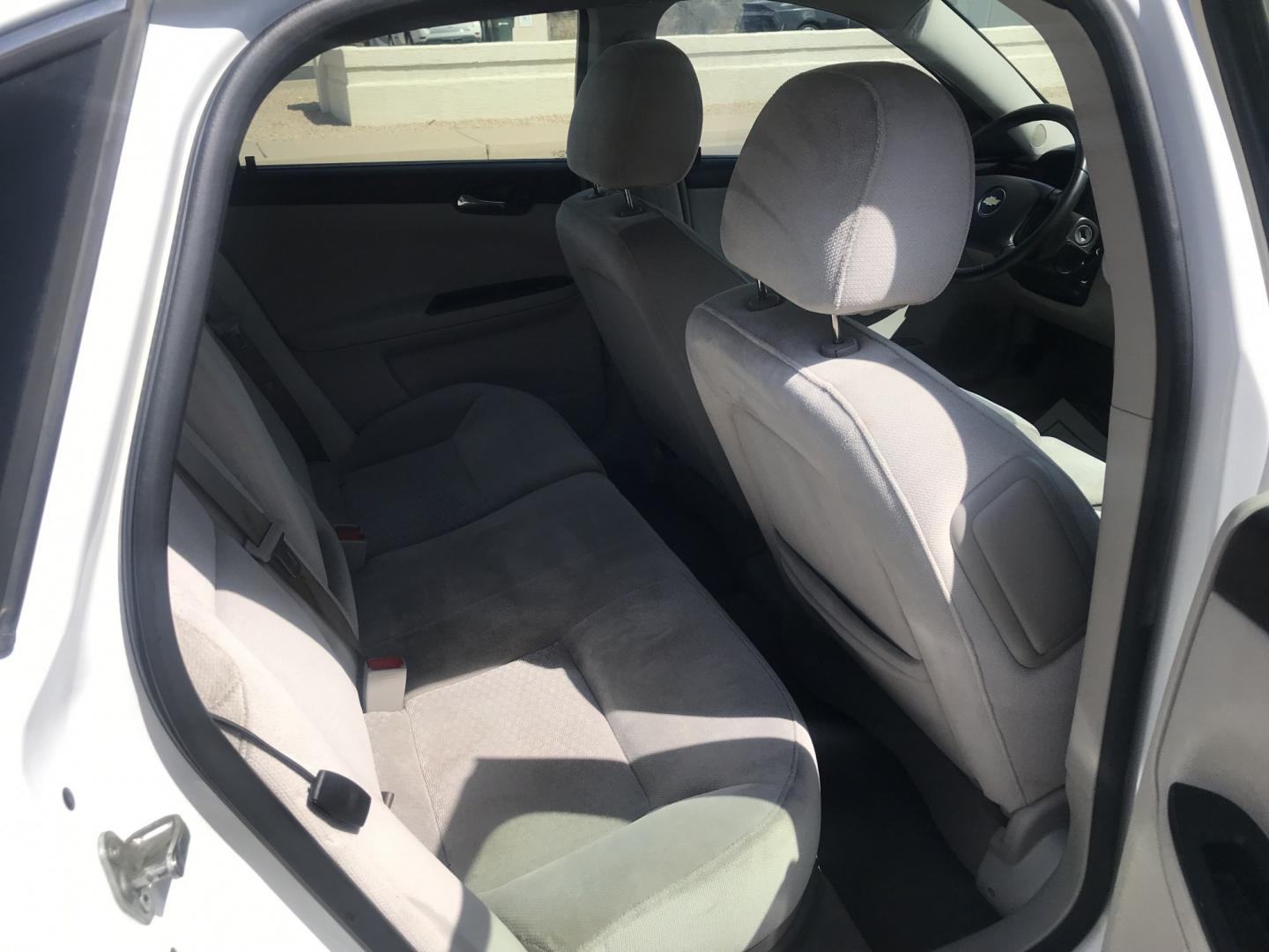 2013 WHITE /gray Chevrolet Impala LT (2G1WB5E3XD1) with an 3.6L V6 DOHC 16V FFV engine, 6-Speed Automatic transmission, located at 323 E Dunlap Ave., Phoenix, AZ, 85020, (602) 331-9000, 33.567677, -112.069000 - 2013 CHEVY IMPALA LT ,........ Automatic, Ice Cold A/C, Beautiful white exterior with gray interior, Premium Sound CD, Michelin tires, This sedan is gorgeous inside and out, Super clean, Well Maintained, Arizona title , Runs and Drives Excellent.....196k original miles, passed emissions..... Call- Photo#9