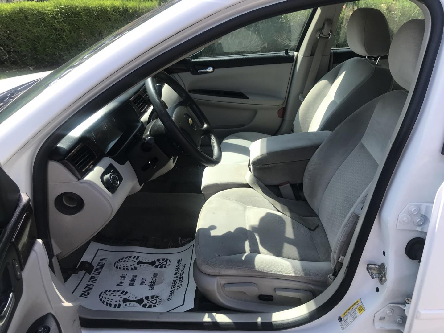 2013 WHITE /gray Chevrolet Impala LT (2G1WB5E3XD1) with an 3.6L V6 DOHC 16V FFV engine, 6-Speed Automatic transmission, located at 323 E Dunlap Ave., Phoenix, AZ, 85020, (602) 331-9000, 33.567677, -112.069000 - 2013 CHEVY IMPALA LT ,........ Automatic, Ice Cold A/C, Beautiful white exterior with gray interior, Premium Sound CD, Michelin tires, This sedan is gorgeous inside and out, Super clean, Well Maintained, Arizona title , Runs and Drives Excellent.....196k original miles, passed emissions..... Call- Photo#13