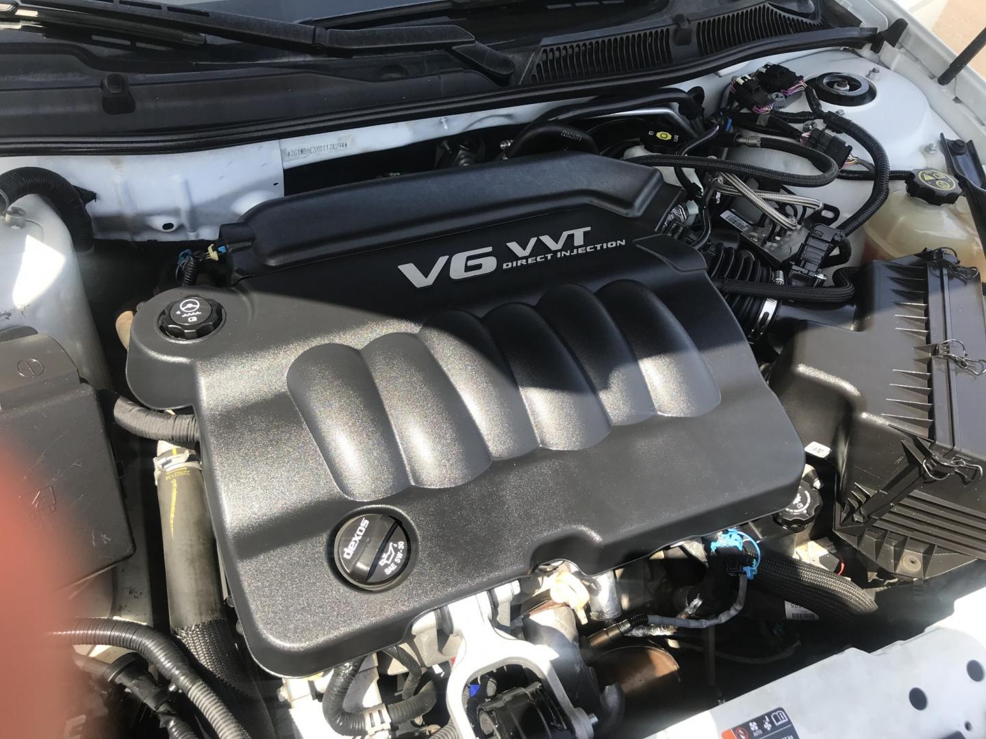2013 WHITE /gray Chevrolet Impala LT (2G1WB5E3XD1) with an 3.6L V6 DOHC 16V FFV engine, 6-Speed Automatic transmission, located at 323 E Dunlap Ave., Phoenix, AZ, 85020, (602) 331-9000, 33.567677, -112.069000 - 2013 CHEVY IMPALA LT ,........ Automatic, Ice Cold A/C, Beautiful white exterior with gray interior, Premium Sound CD, Michelin tires, This sedan is gorgeous inside and out, Super clean, Well Maintained, Arizona title , Runs and Drives Excellent.....196k original miles, passed emissions..... Call- Photo#15