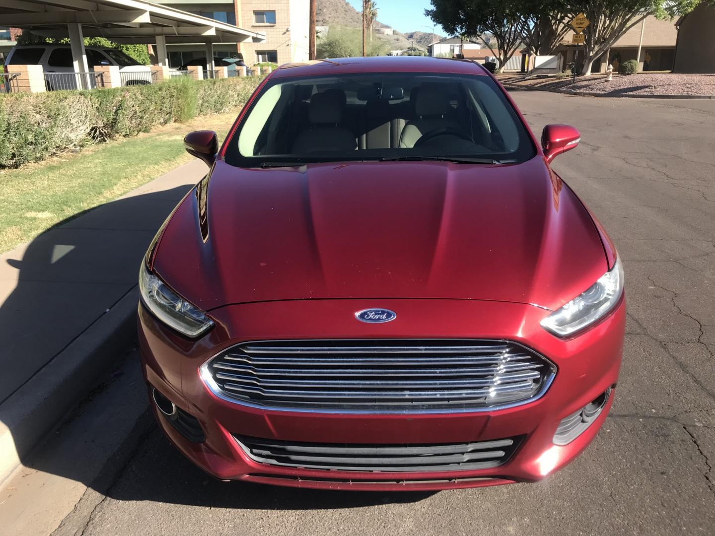 2016 red /BEIGE Ford Fusion SE (3FA6P0HD6GR) with an 1.5L L4 DOHC 16V engine, 6A transmission, located at 323 E Dunlap Ave., Phoenix, AZ, 85020, (602) 331-9000, 33.567677, -112.069000 - 2016 Ford Fusion SE ,........GREAT condition, A Real Must See!!.... LOW 139k miles, Automatic, Power Options, Premium Sound CD, Ice cold ac, Clean red exterior with beige seats, clean Arizona title, Runs and Drives Excellent. Very clean inside and out, SUPER ECONOMICAL Sedan, Any questions Call or t- Photo#3