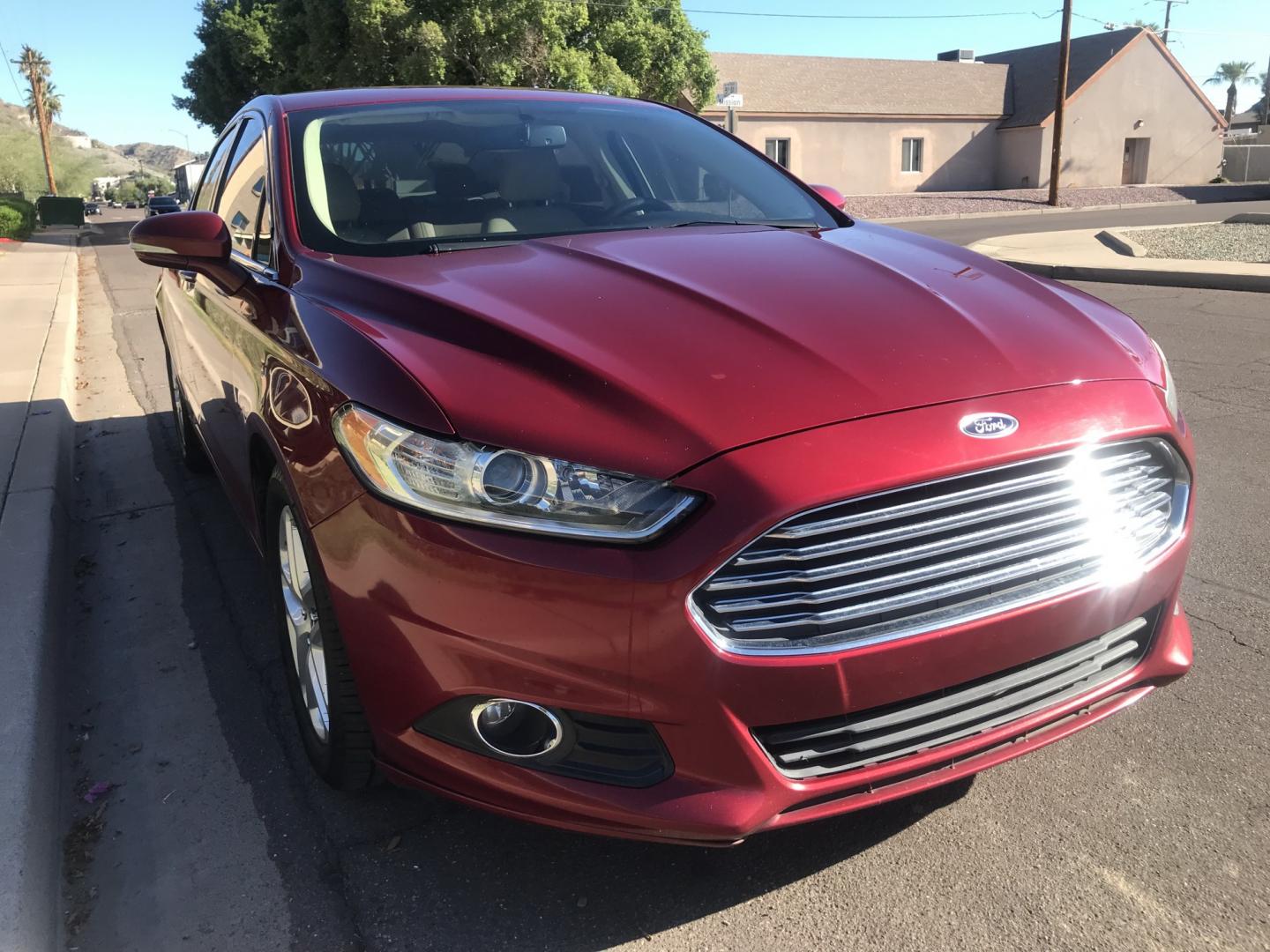 2016 red /BEIGE Ford Fusion SE (3FA6P0HD6GR) with an 1.5L L4 DOHC 16V engine, 6A transmission, located at 323 E Dunlap Ave., Phoenix, AZ, 85020, (602) 331-9000, 33.567677, -112.069000 - 2016 Ford Fusion SE ,........GREAT condition, A Real Must See!!.... LOW 139k miles, Automatic, Power Options, Premium Sound CD, Ice cold ac, Clean red exterior with beige seats, clean Arizona title, Runs and Drives Excellent. Very clean inside and out, SUPER ECONOMICAL Sedan, Any questions Call or t- Photo#4