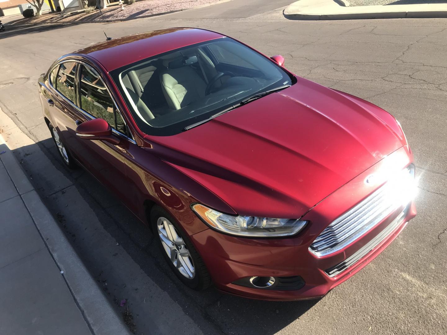 2016 red /BEIGE Ford Fusion SE (3FA6P0HD6GR) with an 1.5L L4 DOHC 16V engine, 6A transmission, located at 323 E Dunlap Ave., Phoenix, AZ, 85020, (602) 331-9000, 33.567677, -112.069000 - 2016 Ford Fusion SE ,........GREAT condition, A Real Must See!!.... LOW 139k miles, Automatic, Power Options, Premium Sound CD, Ice cold ac, Clean red exterior with beige seats, clean Arizona title, Runs and Drives Excellent. Very clean inside and out, SUPER ECONOMICAL Sedan, Any questions Call or t- Photo#5
