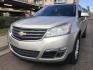2016 gold /gray Chevrolet Traverse 1LT FWD (1GNKRGKDXGJ) with an 3.6L V6 DOHC 24V engine, 6A transmission, located at 323 E Dunlap Ave., Phoenix, AZ, 85020, (602) 331-9000, 33.567677, -112.069000 - 2016 Chevrolet Traverse 1LT FWD SUV ,.......3RD ROW Seating, Great condition,.... Automatic, 6cyl. 3.6L..... Cold A/C, Gold and gray interior with cloth seats in near perfect condition, Backup Camera, Premiumm Sound CD, Power Options, This suv is gorgeous inside and out, Incredible gas mileage! Ariz- Photo#0