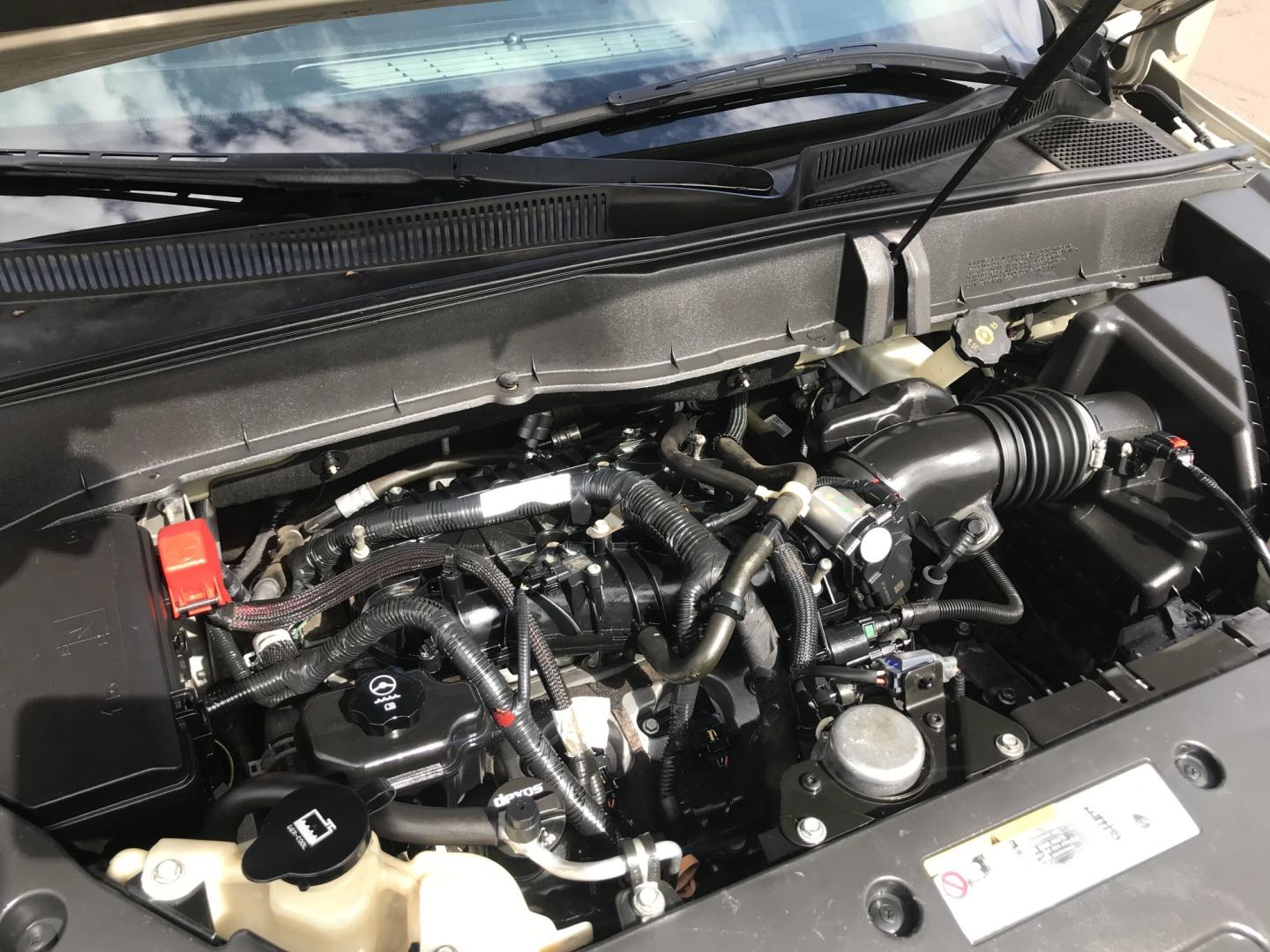 2016 gold /gray Chevrolet Traverse 1LT FWD (1GNKRGKDXGJ) with an 3.6L V6 DOHC 24V engine, 6A transmission, located at 323 E Dunlap Ave., Phoenix, AZ, 85020, (602) 331-9000, 33.567677, -112.069000 - 2016 Chevrolet Traverse 1LT FWD SUV ,.......3RD ROW Seating, Great condition,.... Automatic, 6cyl. 3.6L..... Cold A/C, Gold and gray interior with cloth seats in near perfect condition, Backup Camera, Premiumm Sound CD, Power Options, This suv is gorgeous inside and out, Incredible gas mileage! Ariz- Photo#16